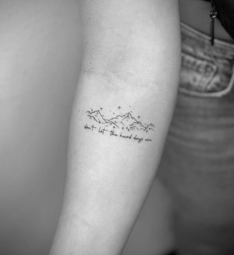 fiminine mountain tattoo
