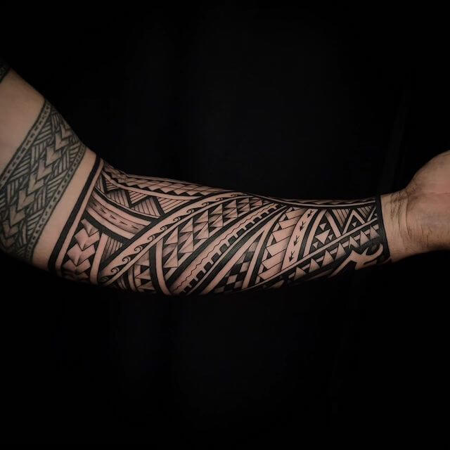 Polynesian sleeve tattoo