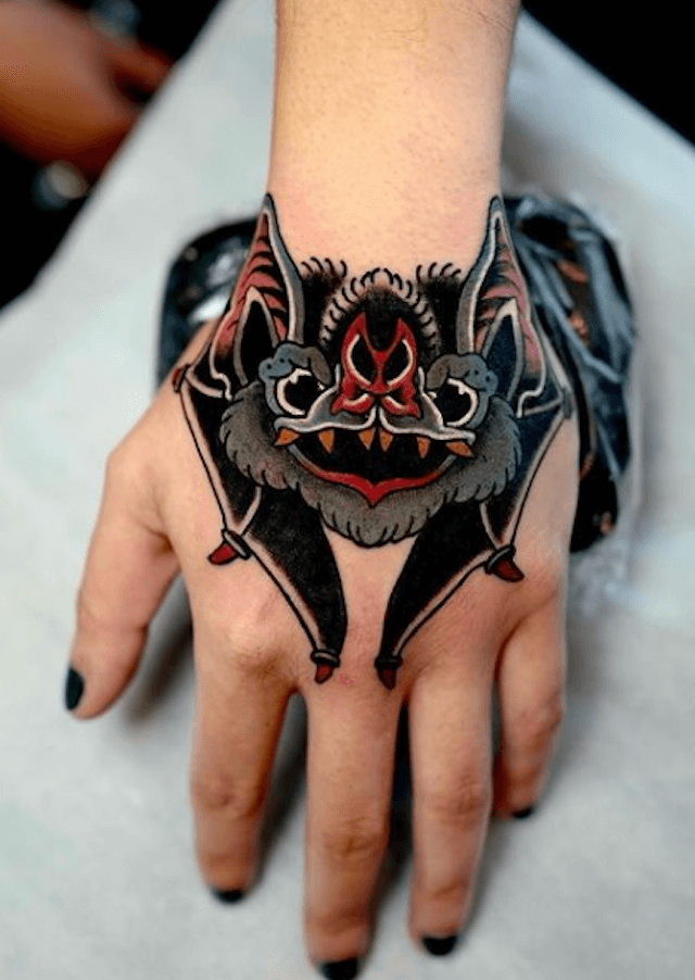 bat tattoo on hand