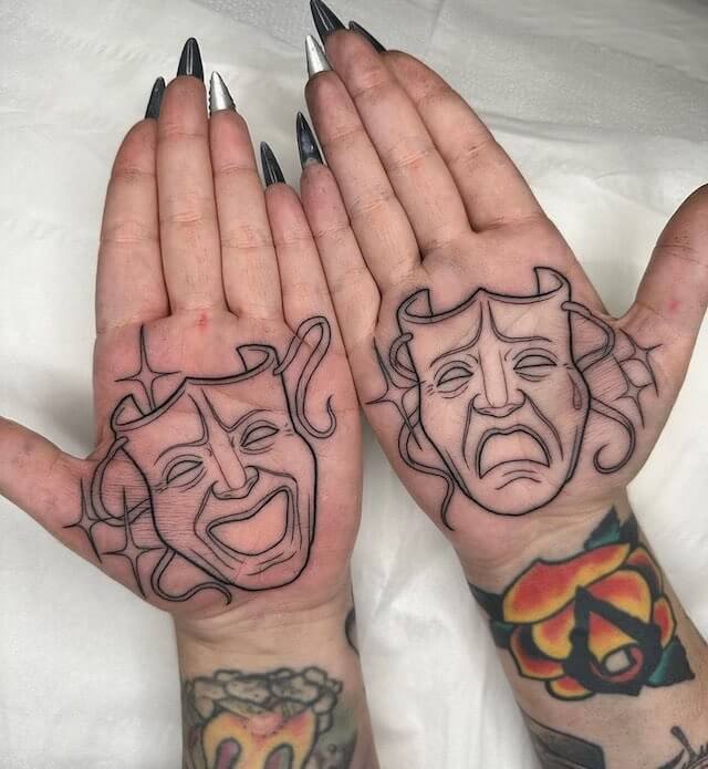 Laugh now cry later palm tattoo