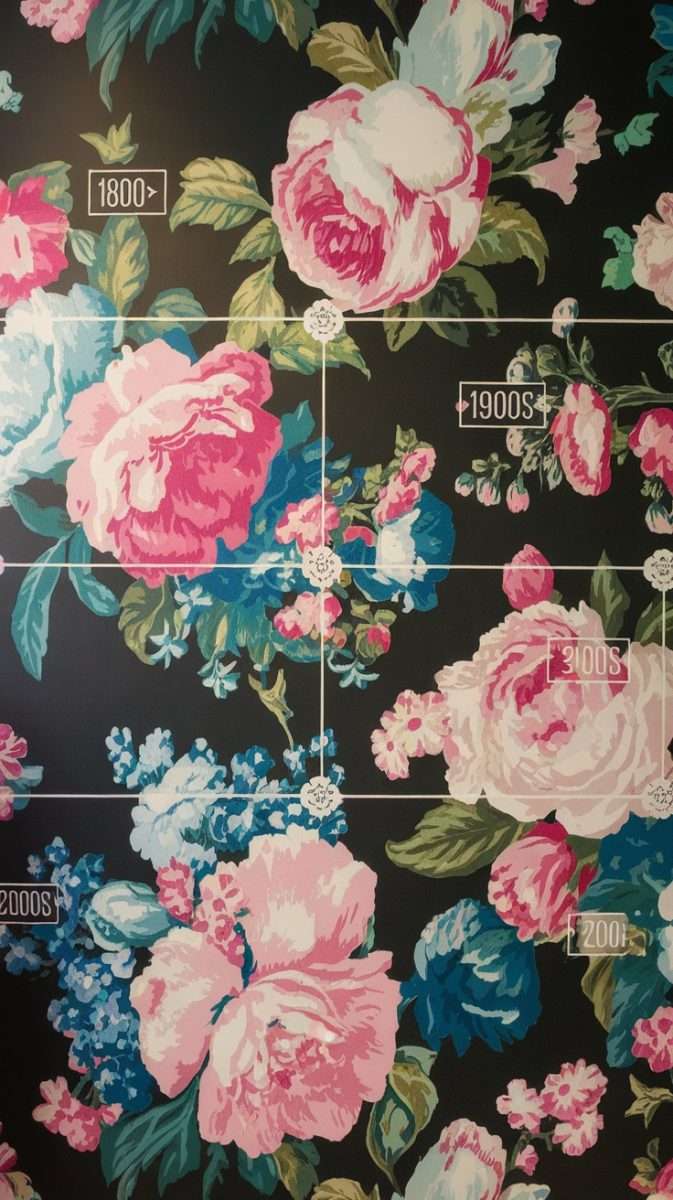 A display of floral wallpaper showcasing designs from the 1800s to the 2000s.